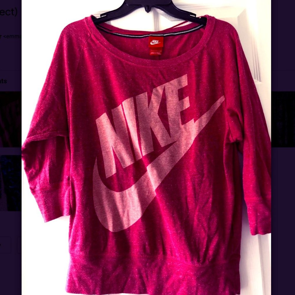 Pink Nike shirt